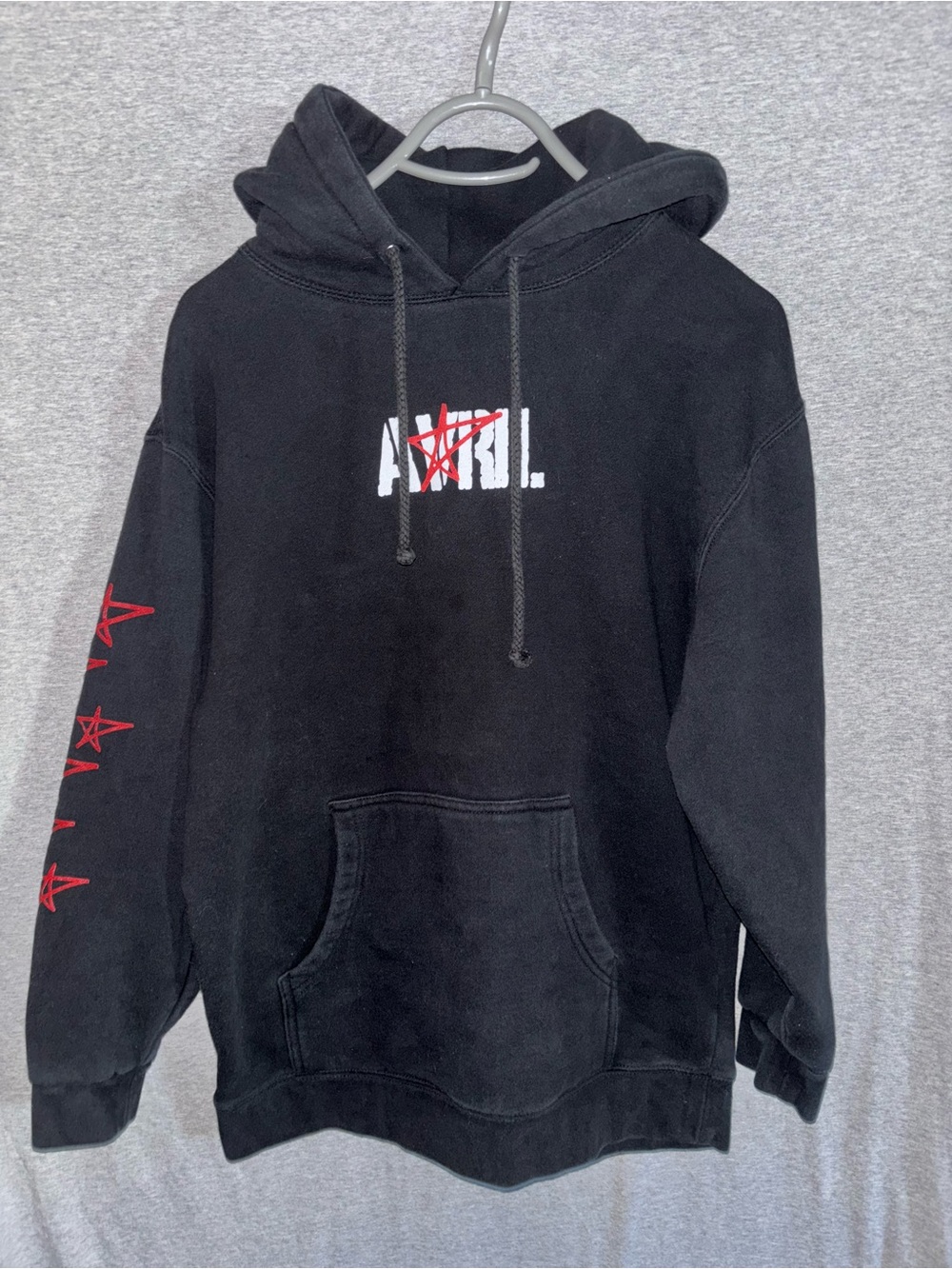 Avril Lavigne Black Graphic Hoodie with Red Star Accents